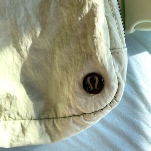 This is a Lululemon everywhere belt bag in a icy light green.  Flaws shown